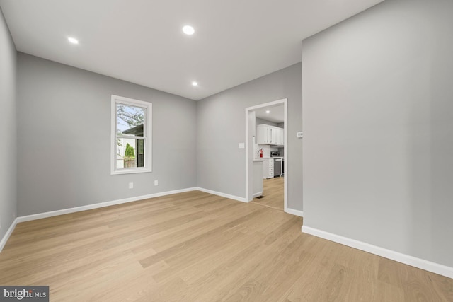 97 Church St, Thorofare, NJ 08086 - unfurnished room with light wood-style flooring, baseboards, and recessed lighting