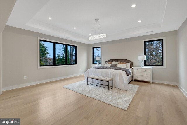 7916 Lewinsville Rd, Mclean, VA 22102 - bedroom featuring a tray ceiling, light wood-type flooring, recessed lighting, and baseboards