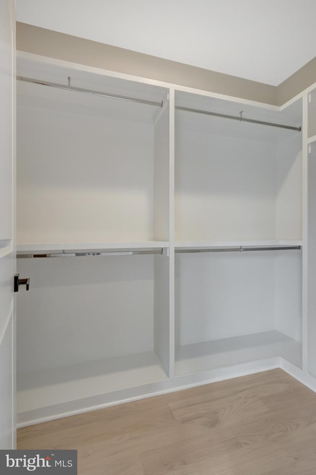 7916 Lewinsville Rd, Mclean, VA 22102 - spacious closet featuring light wood-style flooring