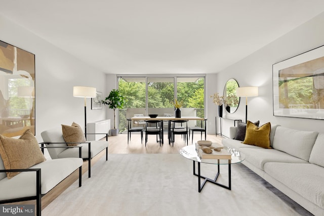 2939 Van Ness St NW Unit 424, Washington, DC 20008 - living room with a wall of windows and wood finished floors