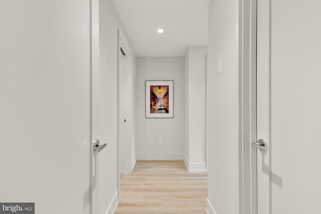 2939 Van Ness St NW Unit 424, Washington, DC 20008 - hallway featuring light wood-type flooring and baseboards