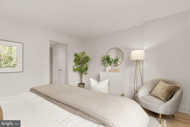 2939 Van Ness St NW Unit 424, Washington, DC 20008 - bedroom with wood finished floors and baseboards