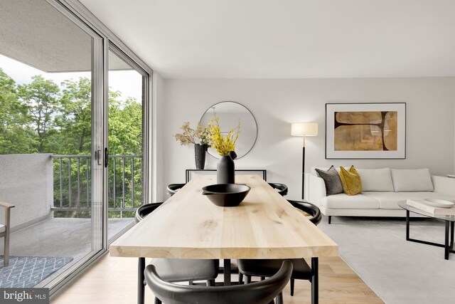 2939 Van Ness St NW Unit 424, Washington, DC 20008 - dining space featuring plenty of natural light and light wood-style floors