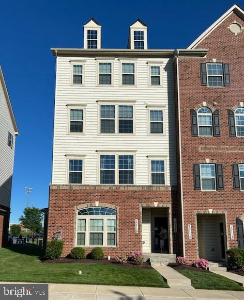 10117 Fosset St, Ijamsville, MD 21754 - view of front facade with brick siding