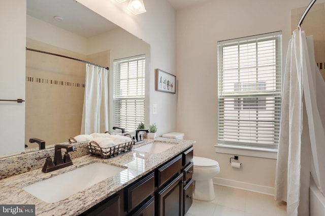 10117 Fosset St, Ijamsville, MD 21754 - full bath featuring toilet, double vanity, baseboards, curtained shower, and tile patterned flooring