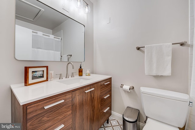1702 Seaton St NW, Washington, DC 20009 - full bathroom featuring baseboards, toilet, and vanity