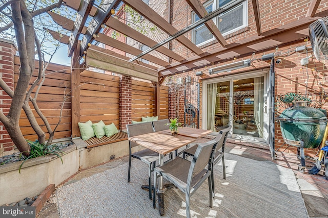 1702 Seaton St NW, Washington, DC 20009 - view of patio featuring outdoor dining space, fence, and a pergola