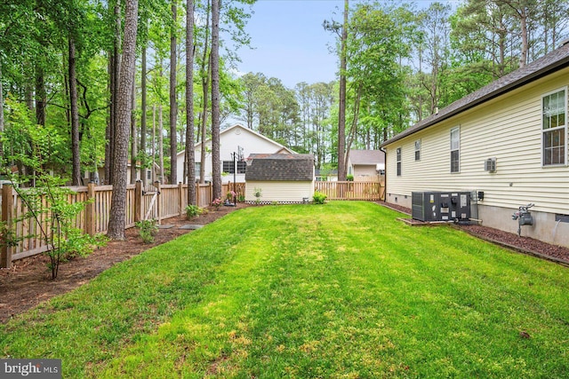 4 Abbey Cir, Ocean Pines, MD 21811 - view of yard with central AC unit and an outbuilding