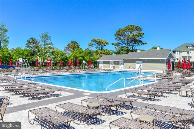 4 Abbey Cir, Ocean Pines, MD 21811 - community pool with fence and a patio area