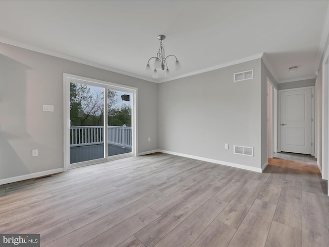 864 Wynonah Dr, Auburn, PA 17922 - empty room with a chandelier, ornamental molding, wood finished floors, and baseboards