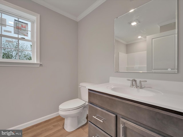 864 Wynonah Dr, Auburn, PA 17922 - bathroom featuring crown molding, wood finished floors, baseboards, toilet, and vanity