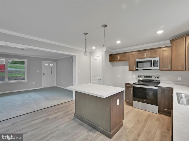 864 Wynonah Dr, Auburn, PA 17922 - kitchen with appliances with stainless steel finishes, light countertops, ornamental molding, light wood-style flooring, and baseboards