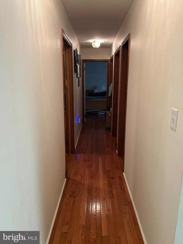 830 Western Ln, Front Royal, VA 22630 - hall with dark wood-type flooring and baseboards