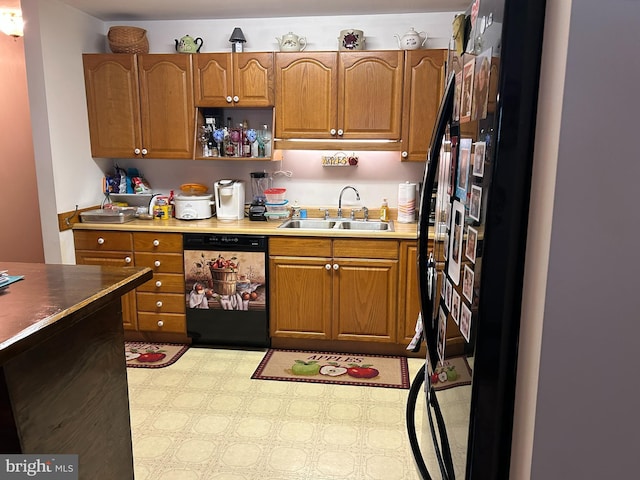 830 Western Ln, Front Royal, VA 22630 - kitchen with dishwasher, a sink, brown cabinets, freestanding refrigerator, and light countertops