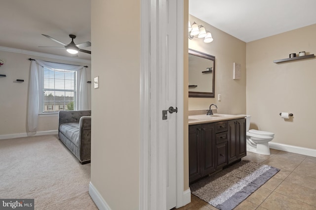 2005 Golden Ct, Mechanicsburg, PA 17055 - bathroom with ceiling fan, toilet, baseboards, vanity, and crown molding