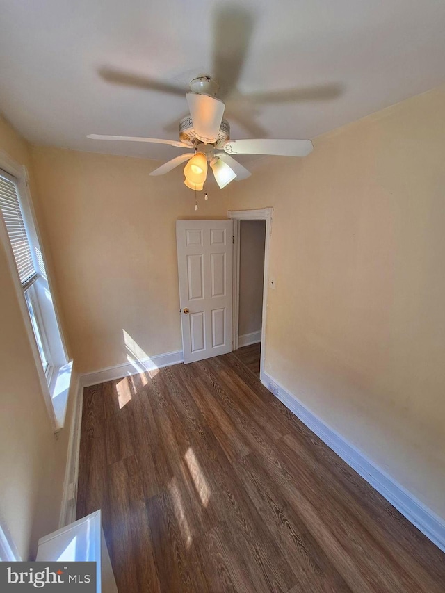126 N Sickels St, Philadelphia, PA 19139 - unfurnished room with baseboards, ceiling fan, and dark wood-type flooring