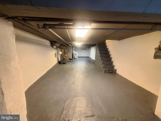126 N Sickels St, Philadelphia, PA 19139 - unfinished basement featuring stairway and heating unit