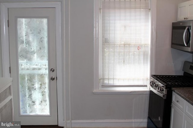 126 N Sickels St, Philadelphia, PA 19139 - doorway to outside with baseboards