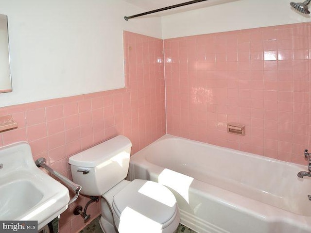 2626 12th St S Unit 1, Arlington, VA 22204 - full bath with tile walls, toilet, a sink, and shower / bath combination