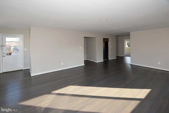 2626 12th St S Unit 1, Arlington, VA 22204 - unfurnished living room with baseboards, dark wood-type flooring, and recessed lighting