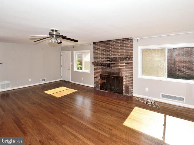 2626 12th St S Unit 1, Arlington, VA 22204 - unfurnished living room featuring wood finished floors, baseboards, and a ceiling fan