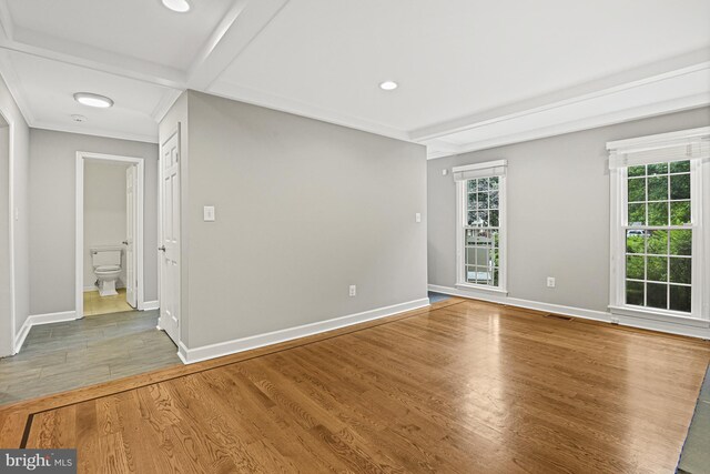 11904 Paradise Ln, Herndon, VA 20171 - empty room with wood finished floors, baseboards, recessed lighting, and beamed ceiling