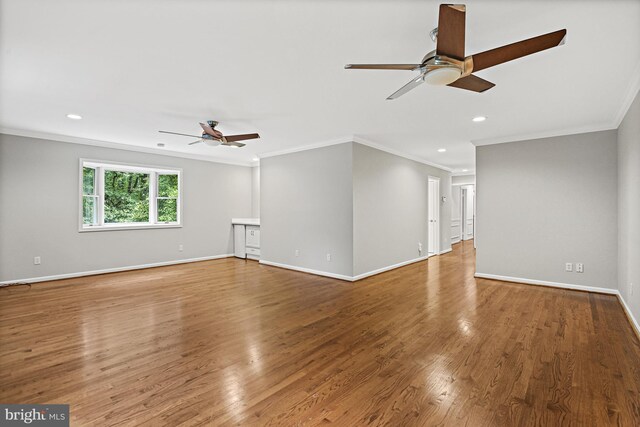 11904 Paradise Ln, Herndon, VA 20171 - spare room featuring a ceiling fan, crown molding, baseboards, wood finished floors, and recessed lighting