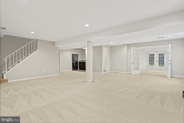11904 Paradise Ln, Herndon, VA 20171 - unfurnished living room featuring light carpet, french doors, stairway, baseboards, and recessed lighting