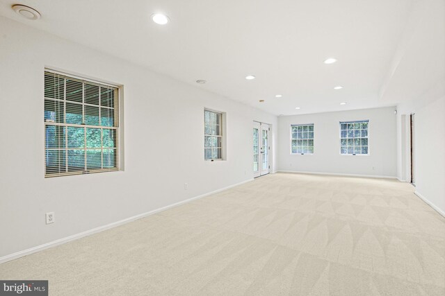 11904 Paradise Ln, Herndon, VA 20171 - spare room with light colored carpet, recessed lighting, and baseboards
