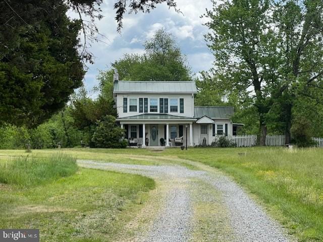 349 Greenbank Rd, Fredericksburg, VA 22406 - view of front facade with driveway, a porch, fence, metal roof, and a chimney