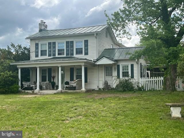 349 Greenbank Rd, Fredericksburg, VA 22406 - view of front facade with a standing seam roof, metal roof, a chimney, and covered porch