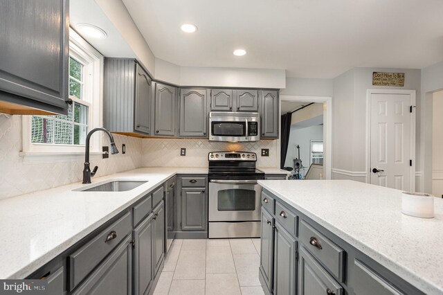 1015 E Macphail, Bel Air, MD 21015 - kitchen featuring appliances with stainless steel finishes, gray cabinetry, a sink, backsplash, and recessed lighting