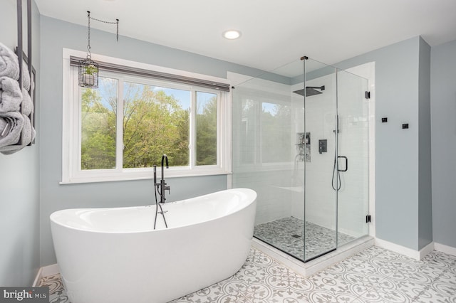 1015 E Macphail, Bel Air, MD 21015 - bathroom with a shower stall, a freestanding tub, baseboards, and recessed lighting