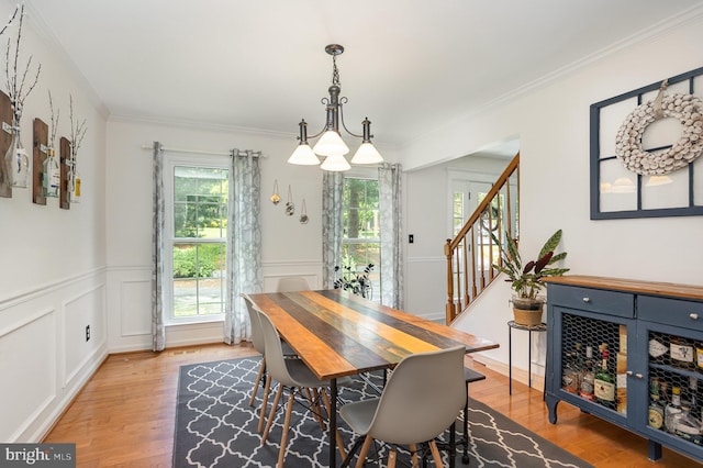 1015 E Macphail, Bel Air, MD 21015 - dining area with light wood-style flooring, ornamental molding, stairway, and a wainscoted wall