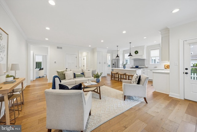 17 W Redman Ave, Haddonfield, NJ 08033 - living room with crown molding, light wood finished floors, and recessed lighting