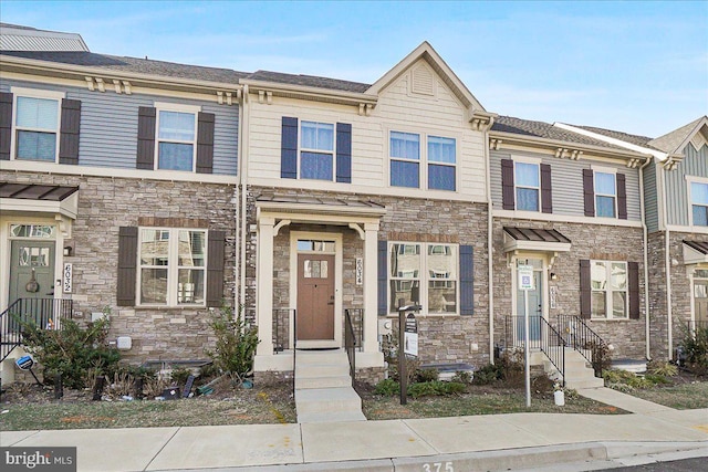 6034 Goshawk St, New Market, MD 21774 - multi unit property featuring stone siding