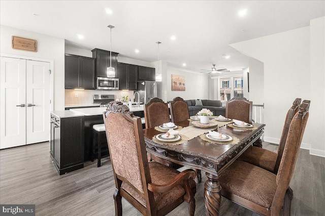 6034 Goshawk St, New Market, MD 21774 - dining room with light wood-type flooring, recessed lighting, and a ceiling fan