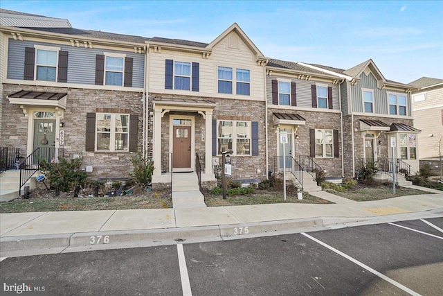 6034 Goshawk St, New Market, MD 21774 - multi unit property with uncovered parking and stone siding