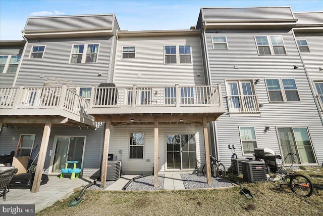6034 Goshawk St, New Market, MD 21774 - rear view of property featuring a patio area