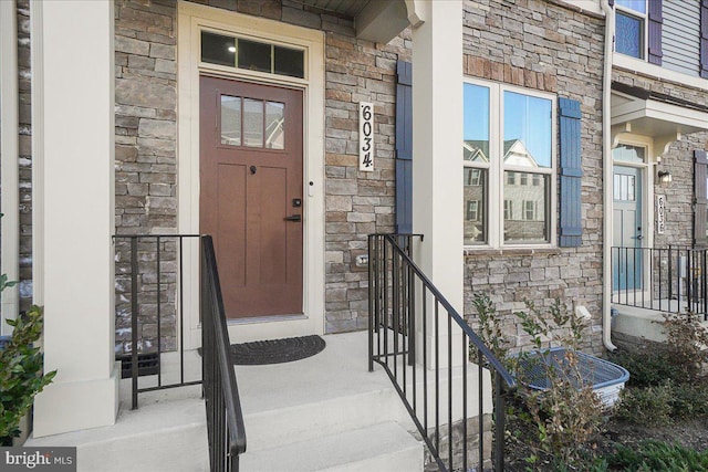6034 Goshawk St, New Market, MD 21774 - doorway to property featuring stone siding
