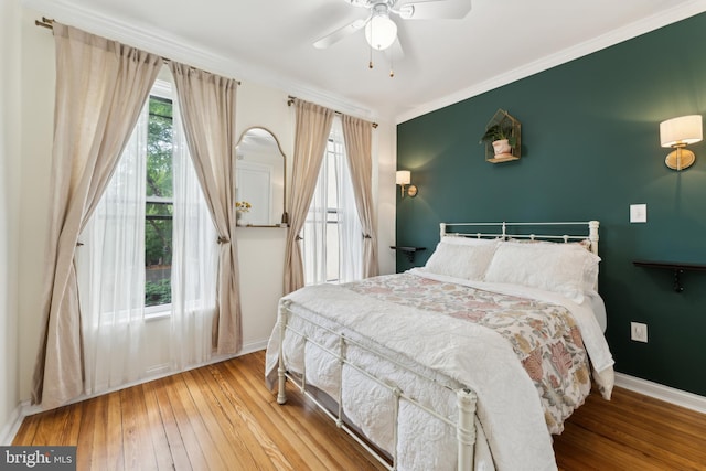 1215 Walter St SE, Washington, DC 20003 - bedroom with hardwood / wood-style floors, baseboards, ceiling fan, and crown molding