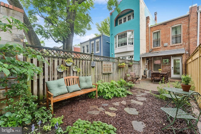 1215 Walter St SE, Washington, DC 20003 - fenced backyard with a patio area