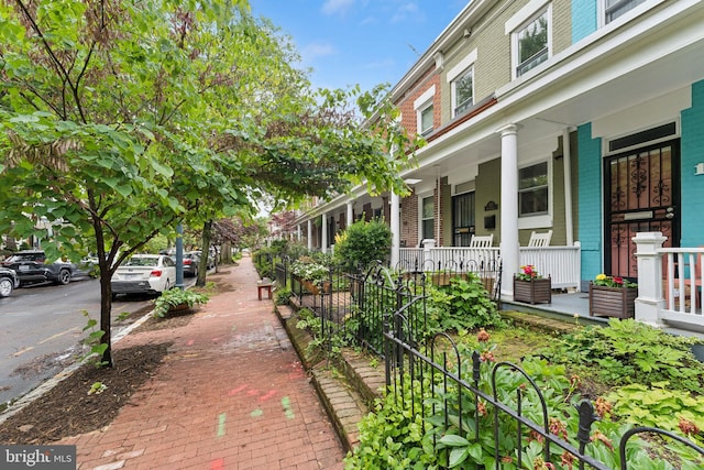 1215 Walter St SE, Washington, DC 20003 - view of side of property featuring a porch and brick siding