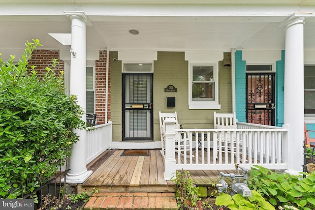 1215 Walter St SE, Washington, DC 20003 - property entrance with covered porch and brick siding