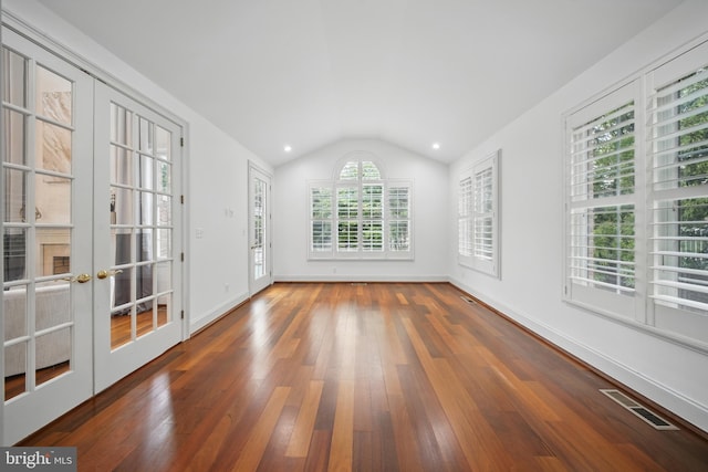 43582 Old Kinderhook Dr, Ashburn, VA 20147 - empty room featuring french doors, wood-type flooring, vaulted ceiling, and baseboards