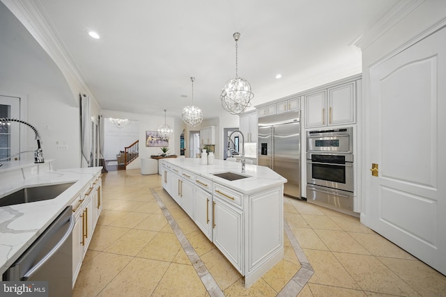 43582 Old Kinderhook Dr, Ashburn, VA 20147 - kitchen with inlaid floor details, a chandelier, appliances with stainless steel finishes, a sink, and recessed lighting