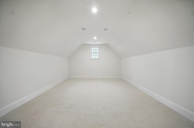 43582 Old Kinderhook Dr, Ashburn, VA 20147 - bonus room with vaulted ceiling, baseboards, recessed lighting, and light carpet