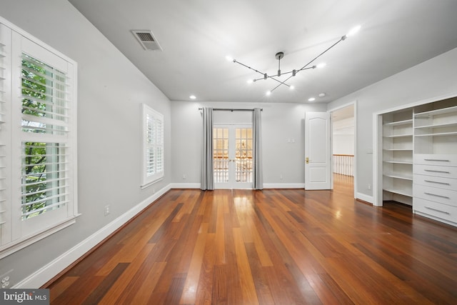 43582 Old Kinderhook Dr, Ashburn, VA 20147 - unfurnished bedroom featuring a chandelier, wood finished floors, baseboards, and recessed lighting