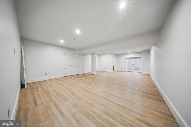 43582 Old Kinderhook Dr, Ashburn, VA 20147 - unfurnished living room featuring recessed lighting, light wood-style flooring, and baseboards