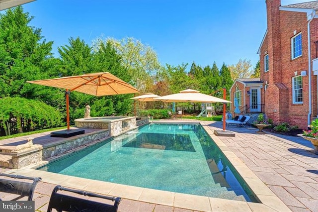 43582 Old Kinderhook Dr, Ashburn, VA 20147 - view of pool featuring a patio area and a pool with connected hot tub